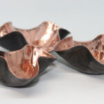 Set of small copper bowls